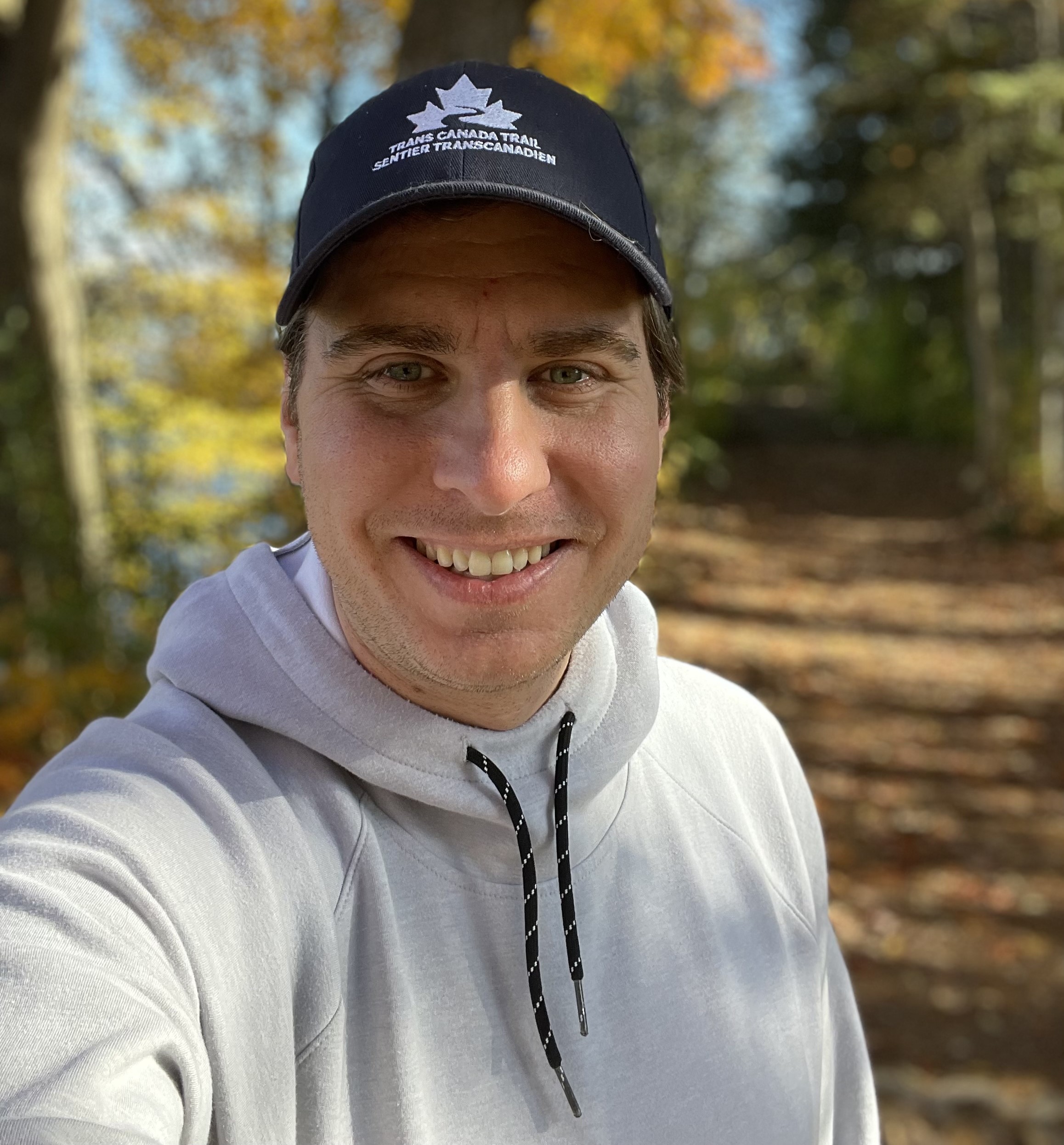 Trevor poses on the trail wearing a Trans Canada Trail hat. Trevor poses on the trail wearing a Trans Canada Trail hat.