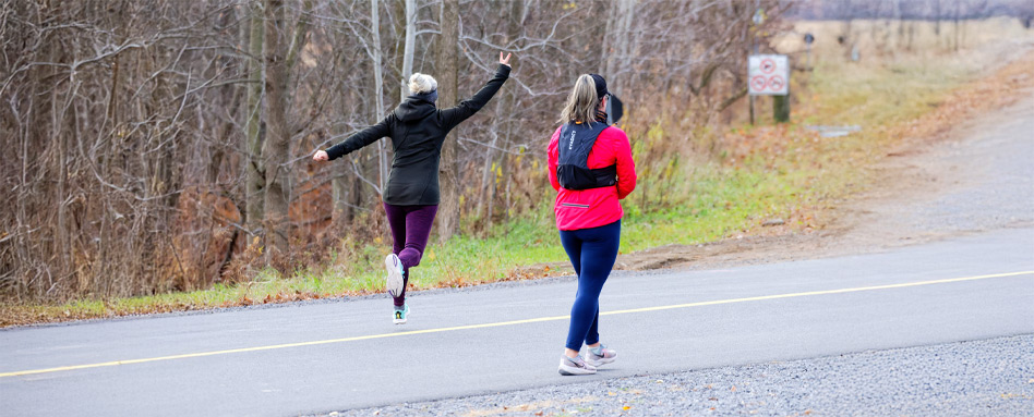 A runner hops excitedly while out for a jog. A runner hops excitedly while out for a jog.